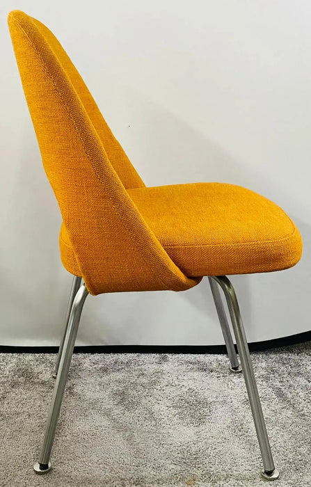 Eero Saarinen for Knoll MCM Tumeric Orange Uphostery Side Chair, a Pair