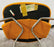 Eero Saarinen for Knoll MCM Tumeric Orange Uphostery Side Chair, a Pair