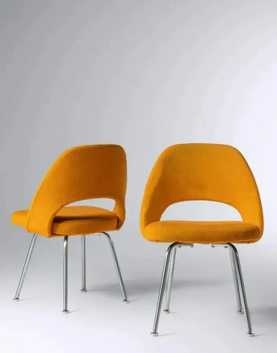 Eero Saarinen for Knoll MCM Tumeric Orange Uphostery Side Chair, a Pair