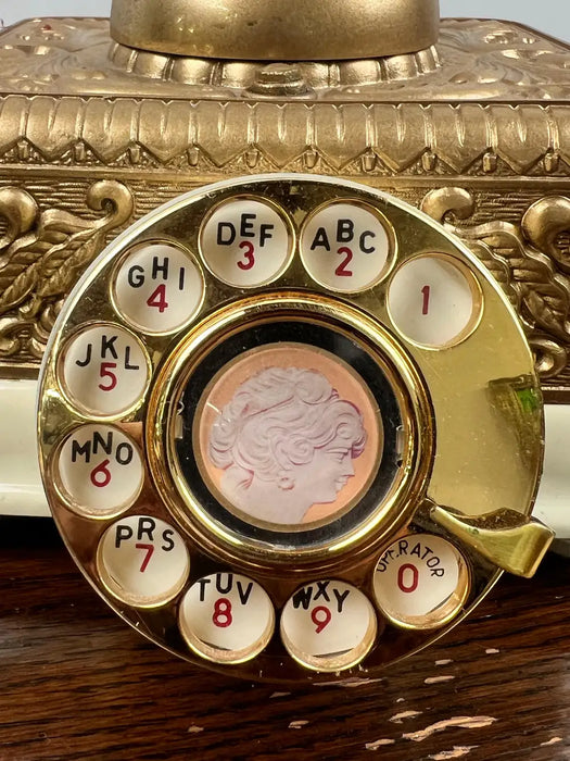 Vintage French Style Brass Rotary Telephone with Ornate Repoussé Cream Enamel Base