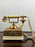 Vintage French Style Brass Rotary Telephone with Ornate Repoussé Cream Enamel Base