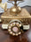 Vintage French Style Brass Rotary Telephone with Ornate Repoussé Cream Enamel Base