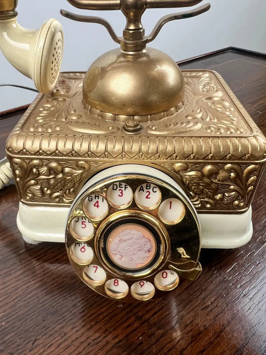 Vintage French Style Brass Rotary Telephone with Ornate Repoussé Cream Enamel Base