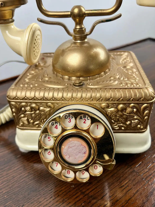 Vintage French Style Brass Rotary Telephone with Ornate Repoussé Cream Enamel Base