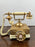 Vintage French Style Brass Rotary Telephone with Ornate Repoussé Cream Enamel Base