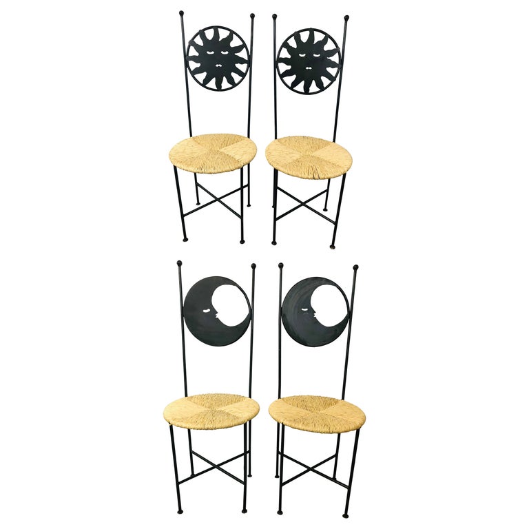 Art Deco French Wrought Iron Moon and Sun Rattan Seat Chairs, a Set of Four