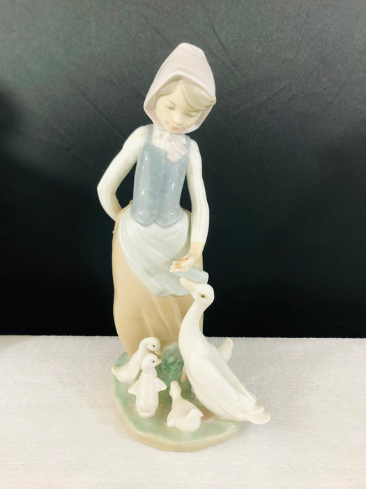 LLadro Porcelain Figurines, a Set of 4