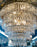 A French Louis XVI Empire Style Bronze and Crystal Chandelier