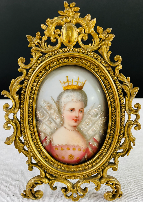 19th Century Porcelain Portrait Plaque in a Brass Frame, a Pair