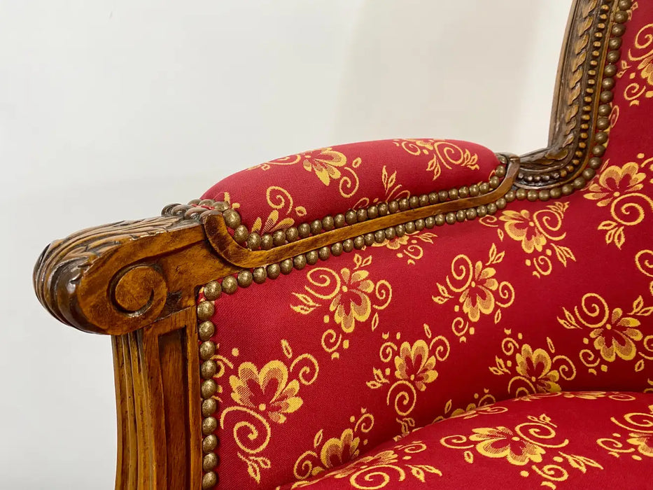 French Louis XVI Style Bergere Walnut Armchair in Red Upholstery, a Pair